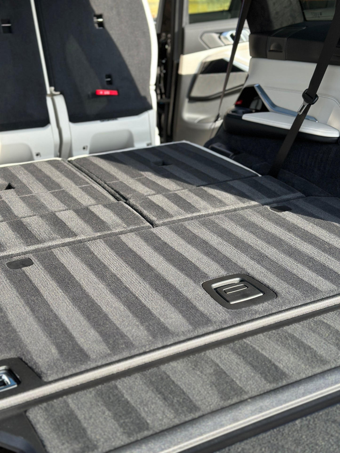 BMW X7 in market Harborough showing how clean the boot is with carpet lines