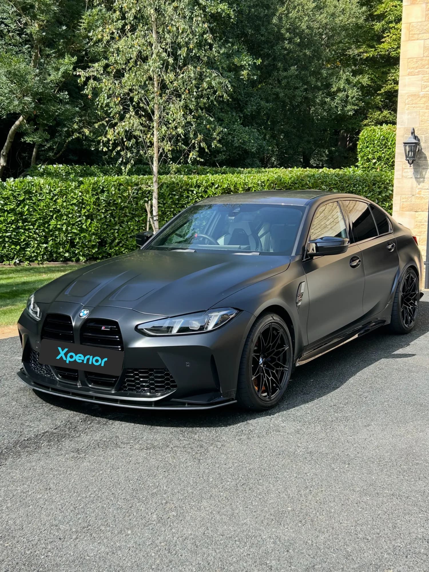 Matte black BMW M3 Competition cleaned on a maintenance plan