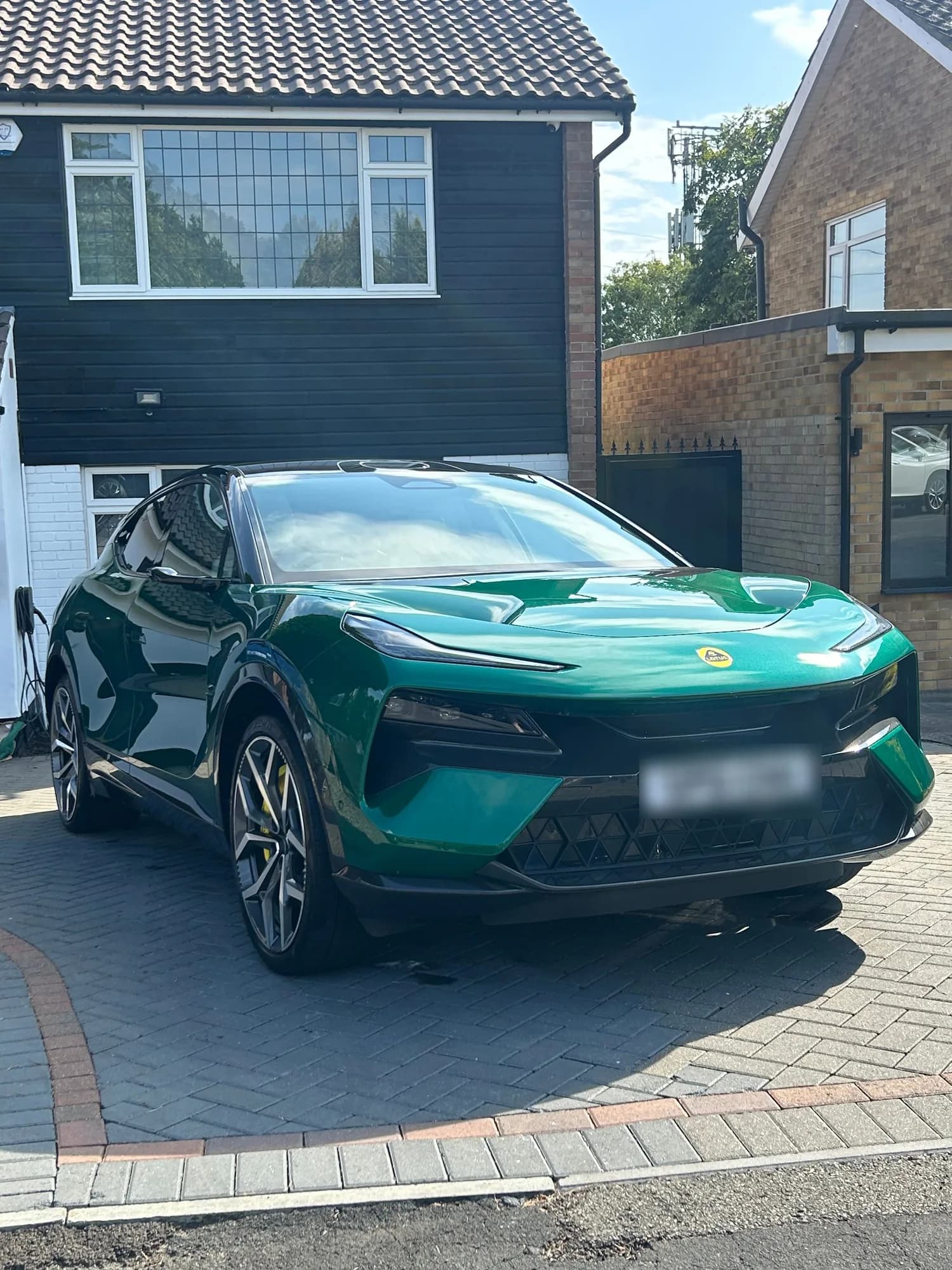 Lotus Eletre in green detailed on a driveway in Northampton