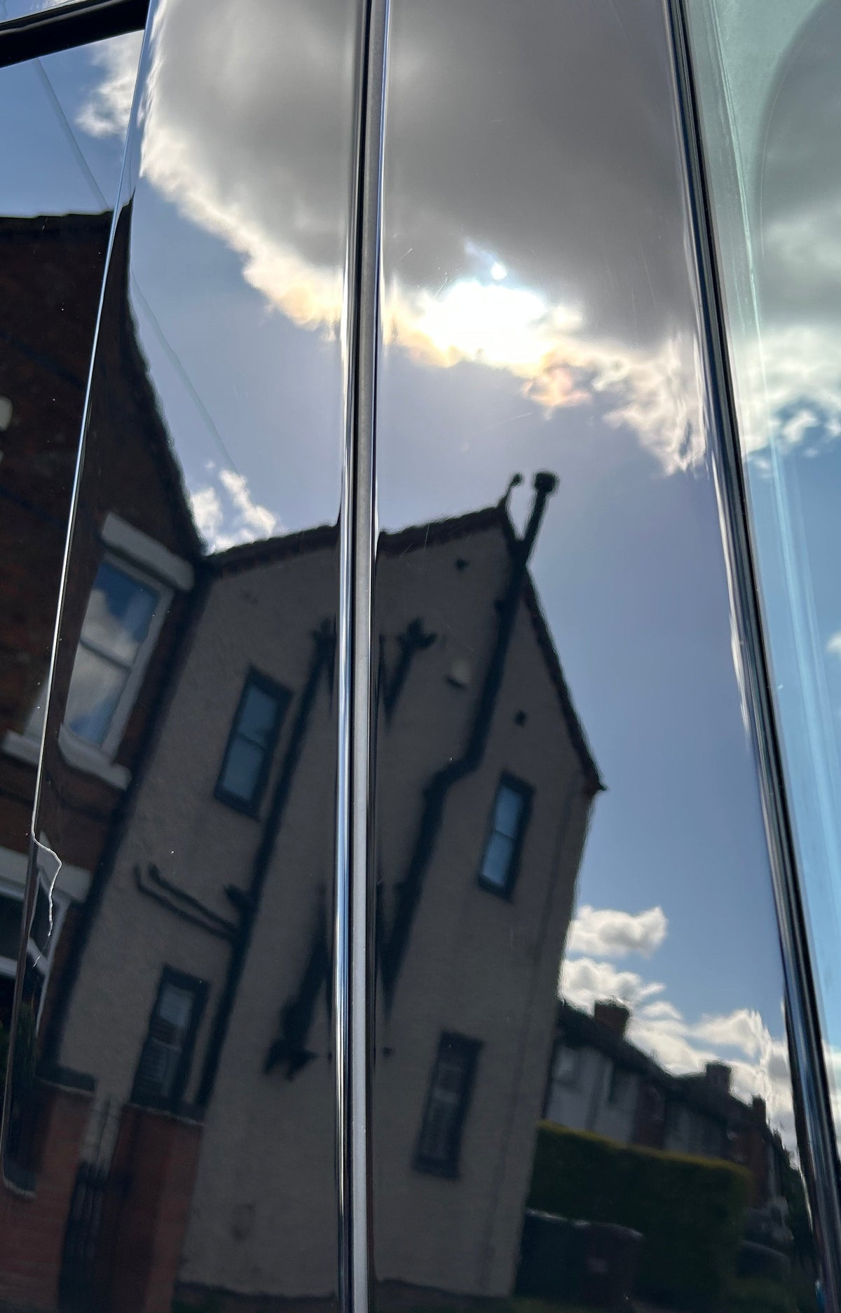 Piano Black Exterior Trims on Land Rover defender very glossy after polishing