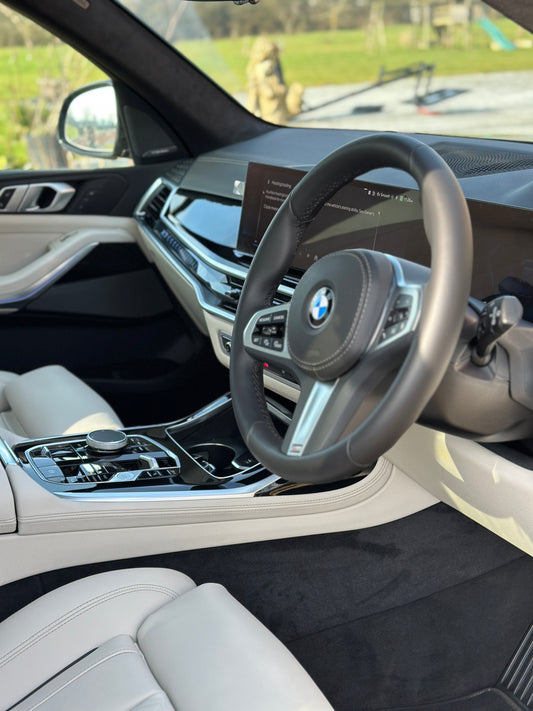 Matte leather steering wheel after leather cleaning, very glossy dashboard after interior deep clean