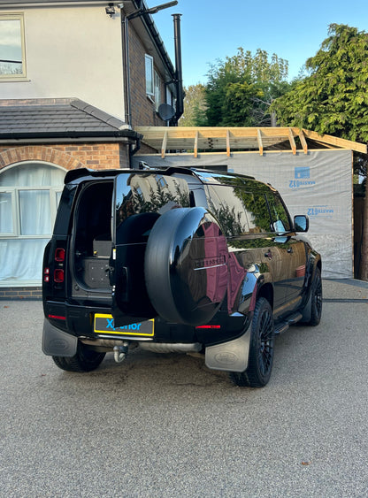 Glossy Land Rover Defender with Urban Body kit after mobile detailing and valeting