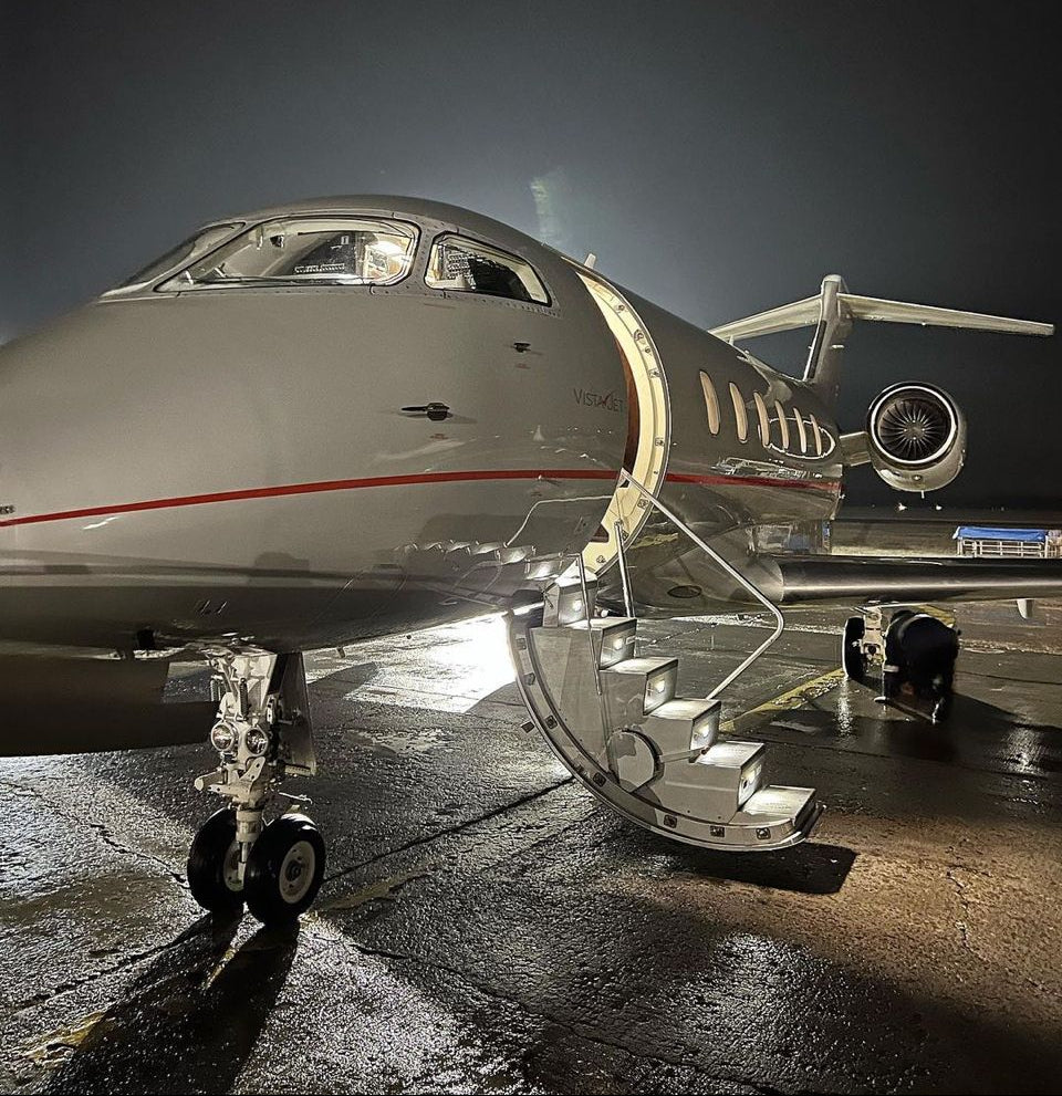 Glossy Private Jet at night after emergency detail